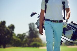 walking golfer grip golf club